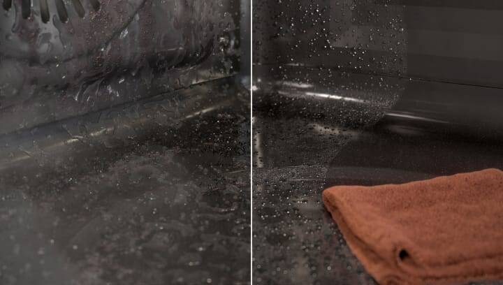 A dirty oven is being cleaned with steam.