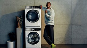 Man next to washing machines